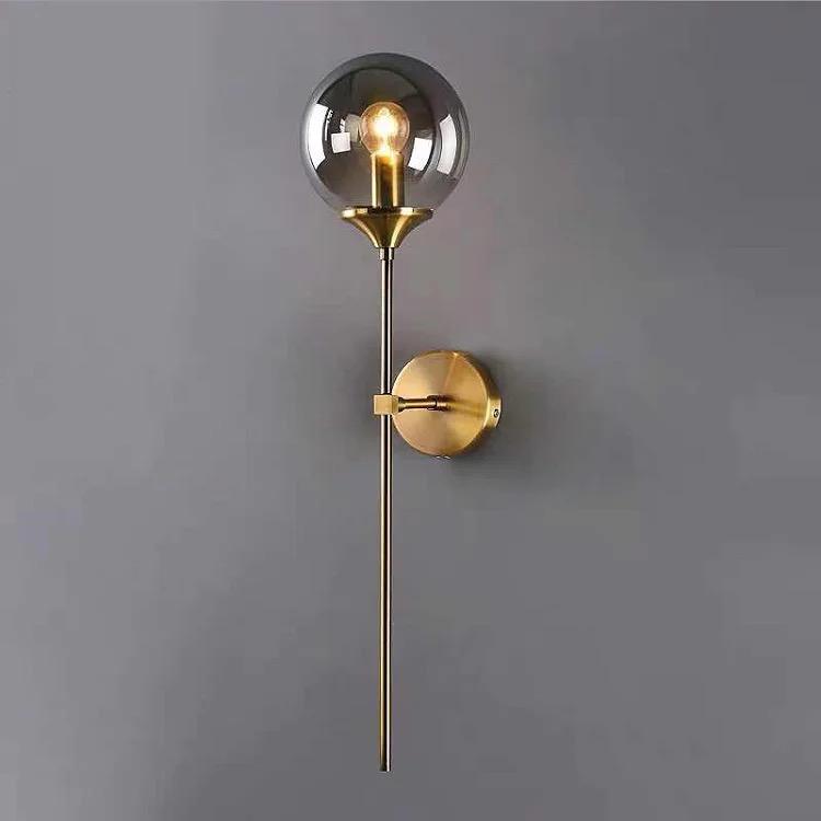 Modern Wall Sconce Light Fixture, Glass Globe Shade, Brass Finish, Long Stem Design