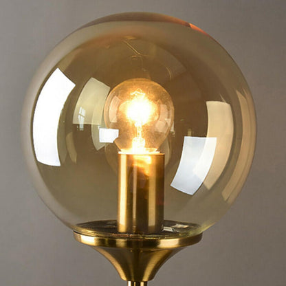 Modern Wall Sconce Light Fixture, Glass Globe Shade, Brass Finish, Long Stem Design